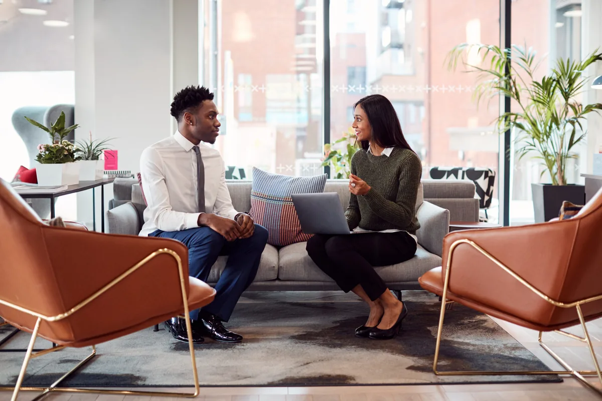 Executive discussing a discreet leadership search behind closed doors